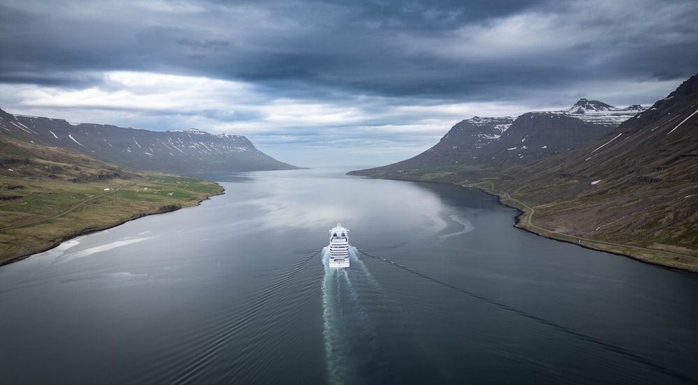 a boat traveling through a large body of water