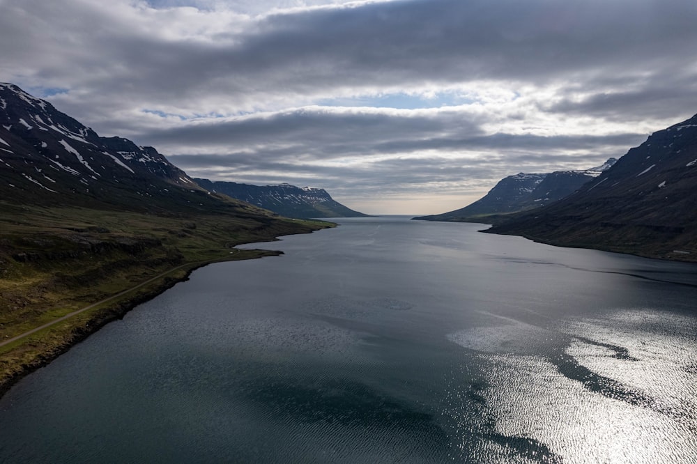 a large body of water surrounded by mountains