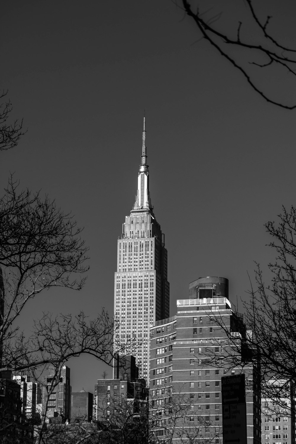 a black and white photo of the empire building