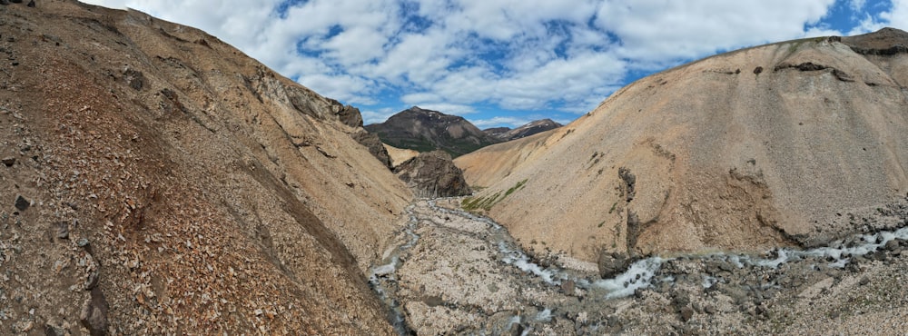 a view of a river running between two mountains