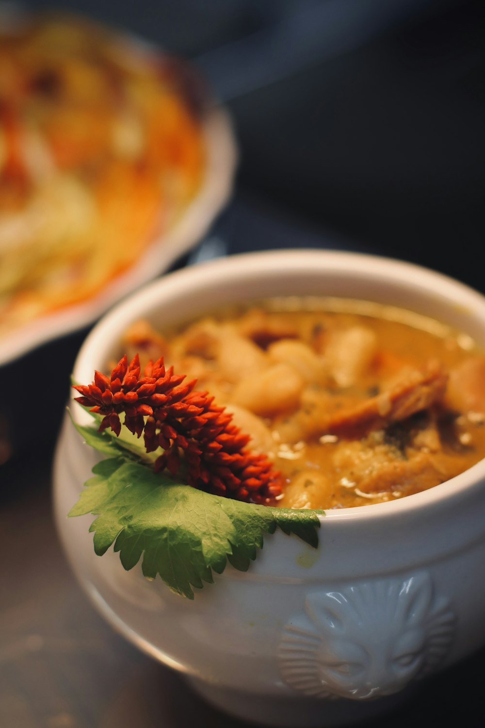 a close up of a bowl of food on a table