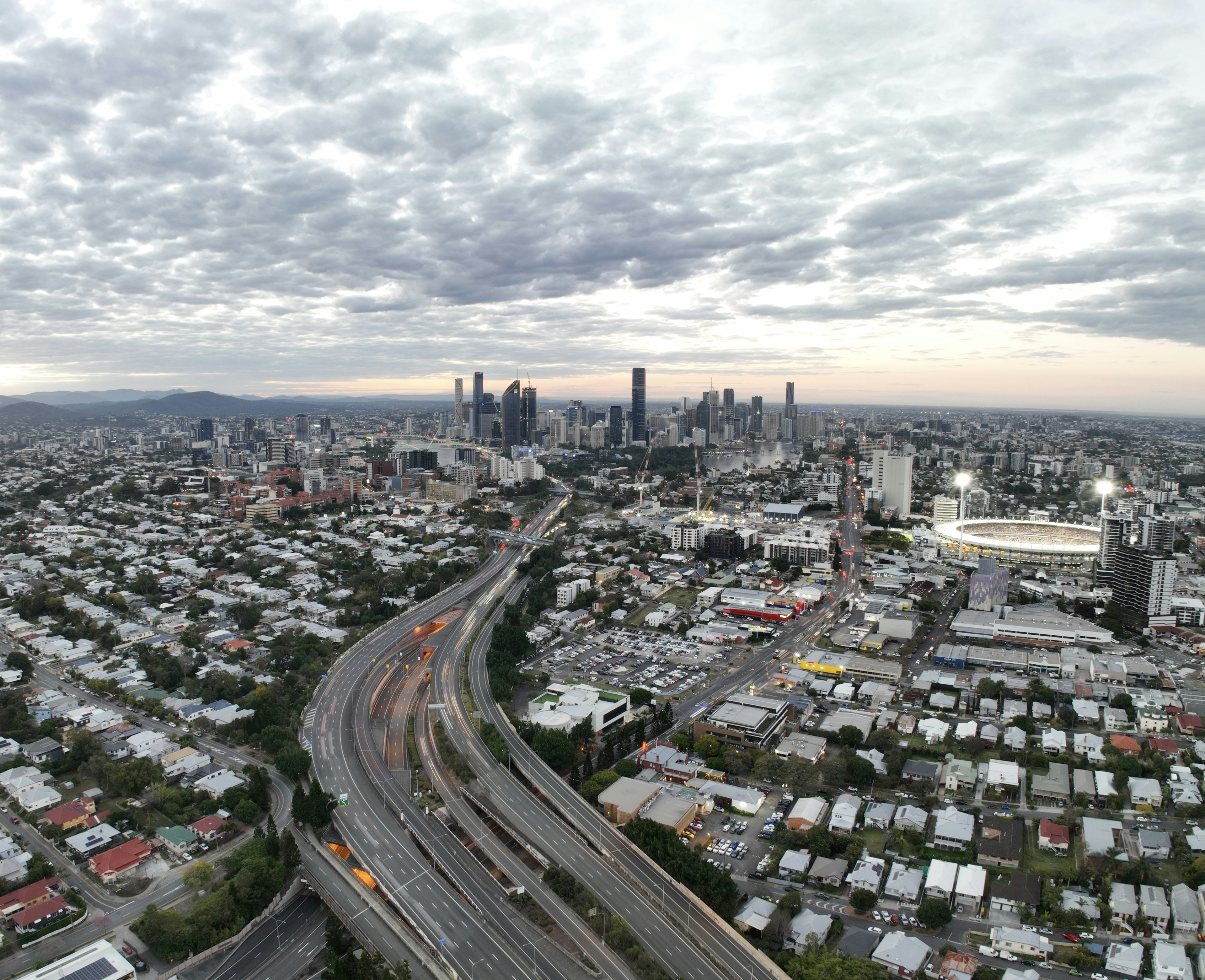 Aerial view of Brisbane highway and city — urban road infrastructure