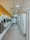 A vibrant gym restroom showcasing the durable cubicles by Doha Cubicles.