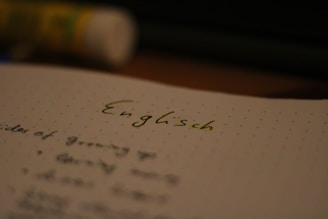 a close up of a book with writing on it