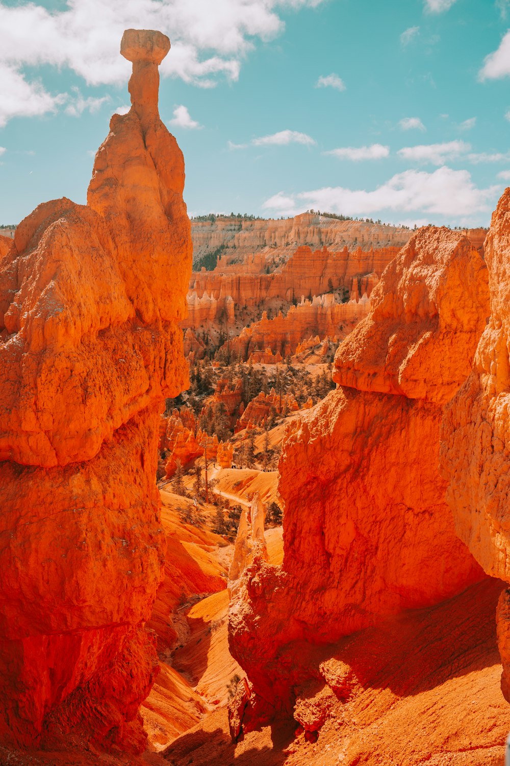 a large rock formation in the middle of a desert