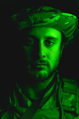 A dynamic military leader energetically guiding his team contrasted with a focused business leader directing a challenging project.