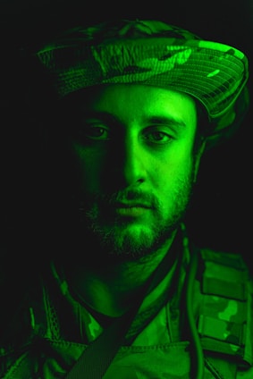 A dynamic military leader energetically guiding his team contrasted with a focused business leader directing a challenging project.