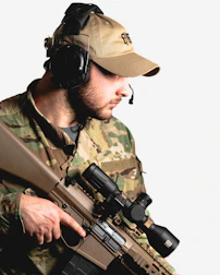 Customer service team assisting a client with personalized military equipment choices.