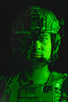 a man with green night vision system