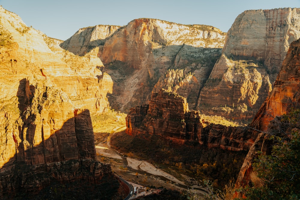 a view of a canyon with mountains in the background