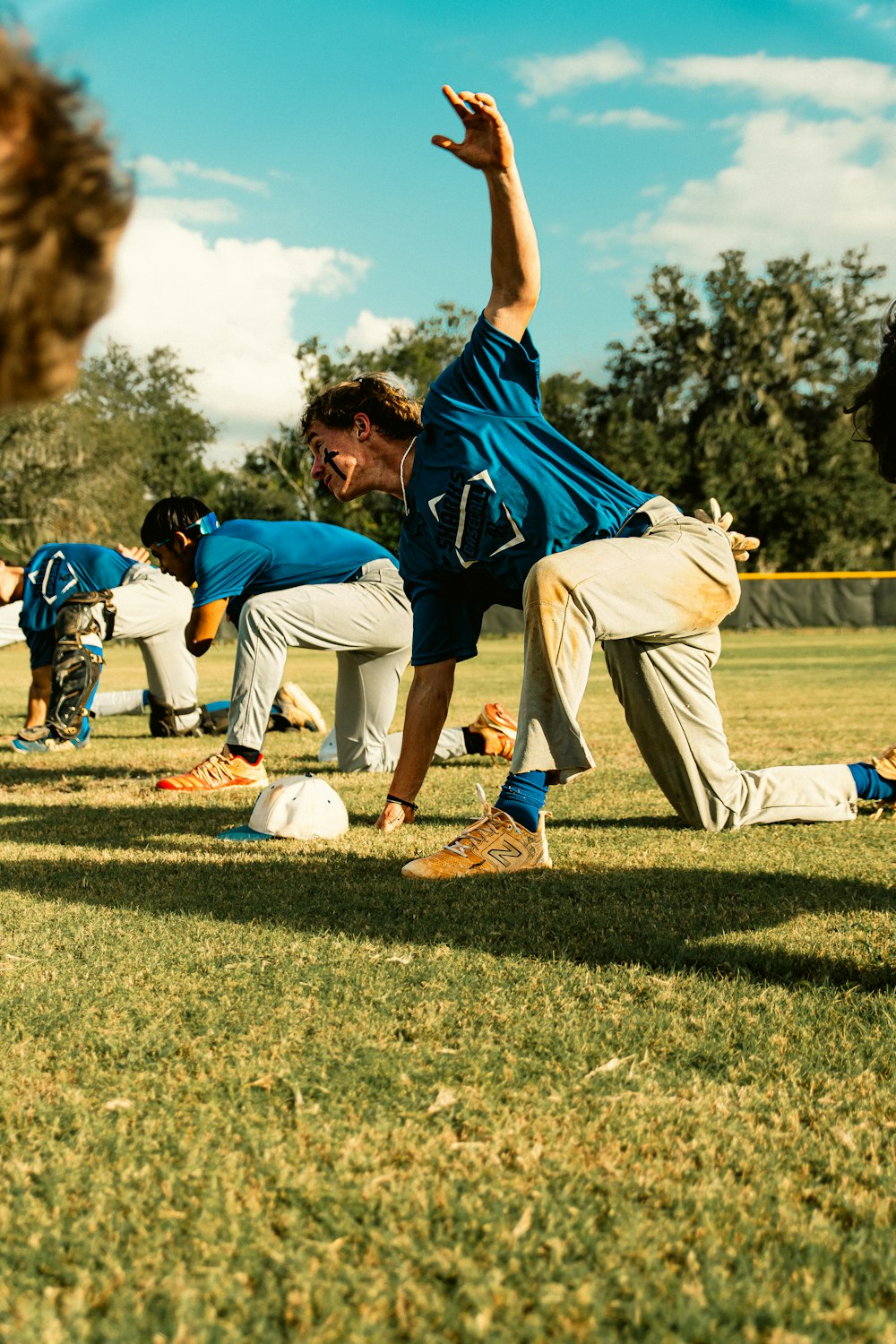 a group of young men playing a game of baseball