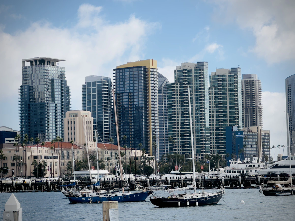 San Diego harbour with waterfront buildings and boats at sunset