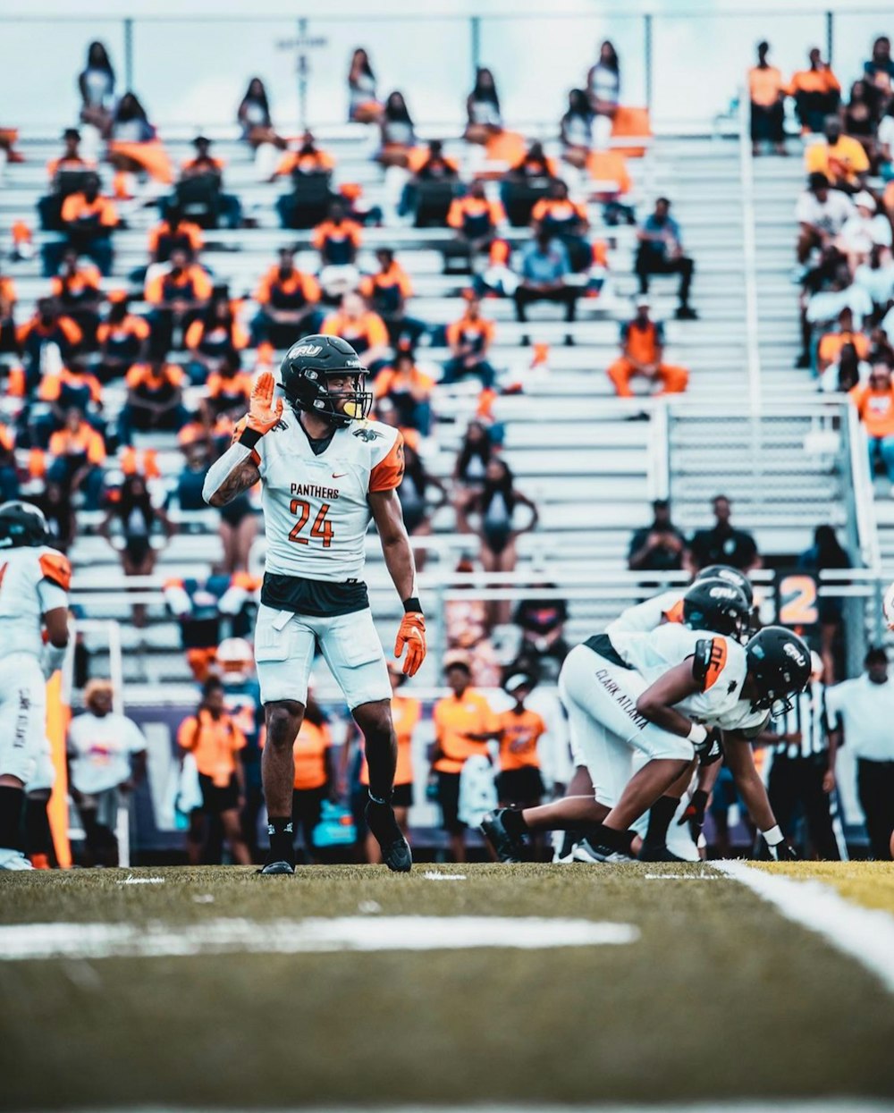 a football player throwing a ball during a game