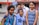 A group of diverse students smiling together on campus.