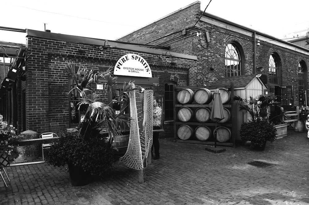 a black and white photo of a brick building