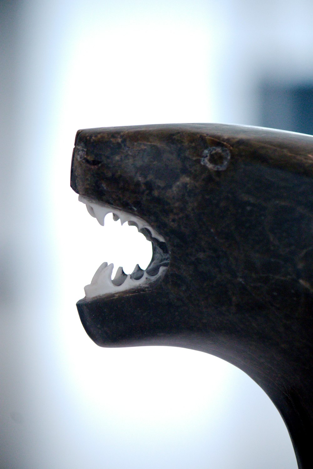 a close up of a toy shark with its mouth open