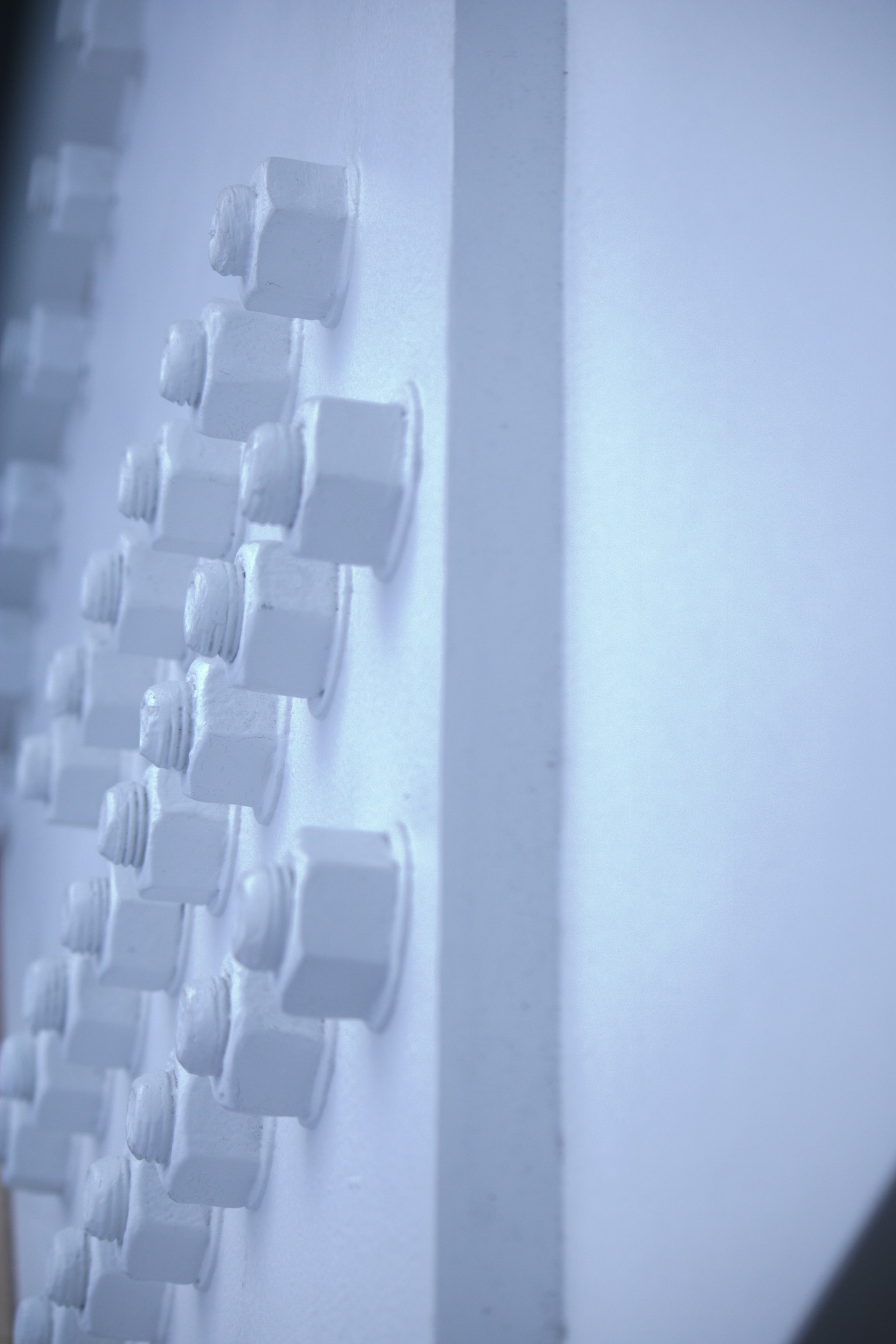 woman wearing yellow long-sleeved dress under white clouds and blue sky during daytime