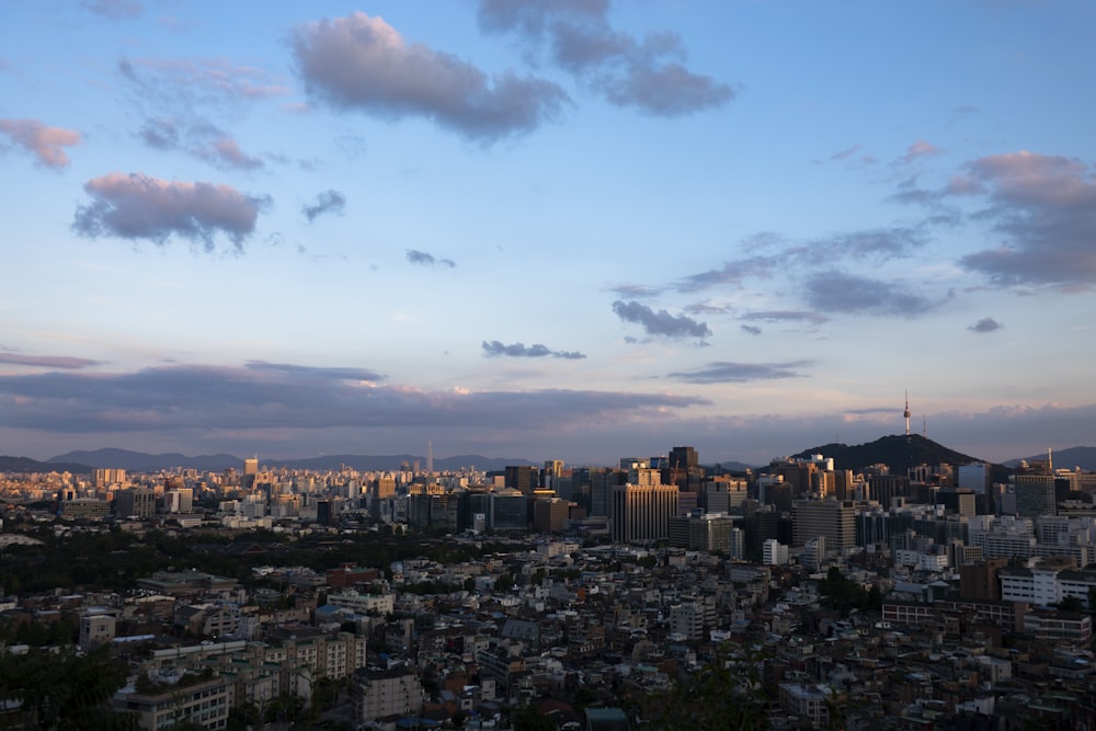 a view of a city from a hill