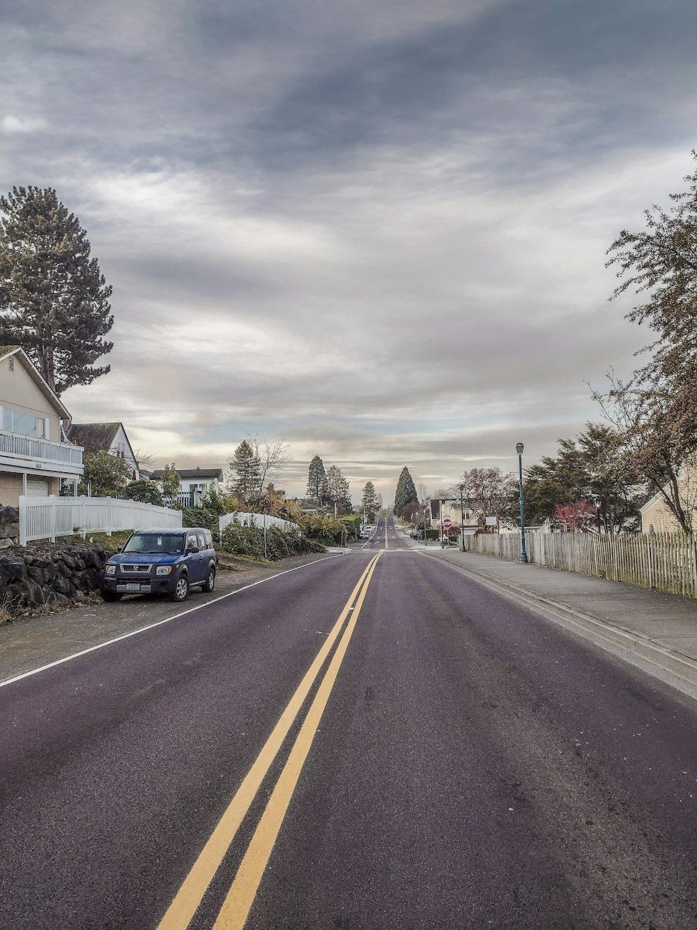 a car is parked on the side of the road