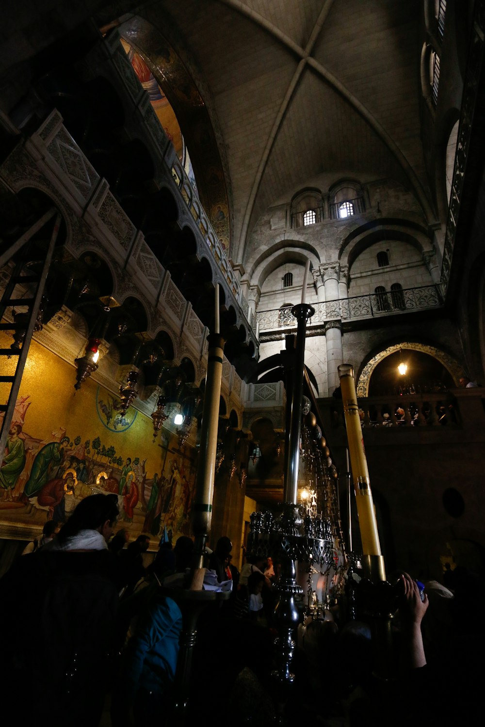 a group of people standing in a church