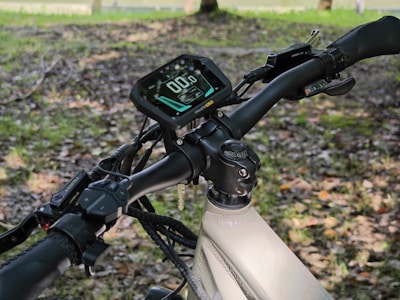 Electric bike speedometer mounted on a modern electric bike in natural light.
