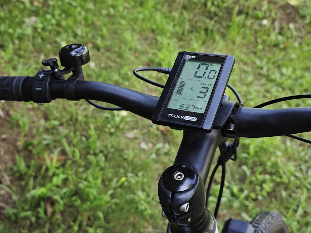 a close up of a bike with a speedometer