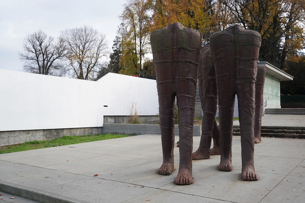 a statue of two legs standing next to each other