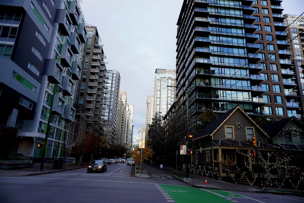 a city street with a lot of tall buildings