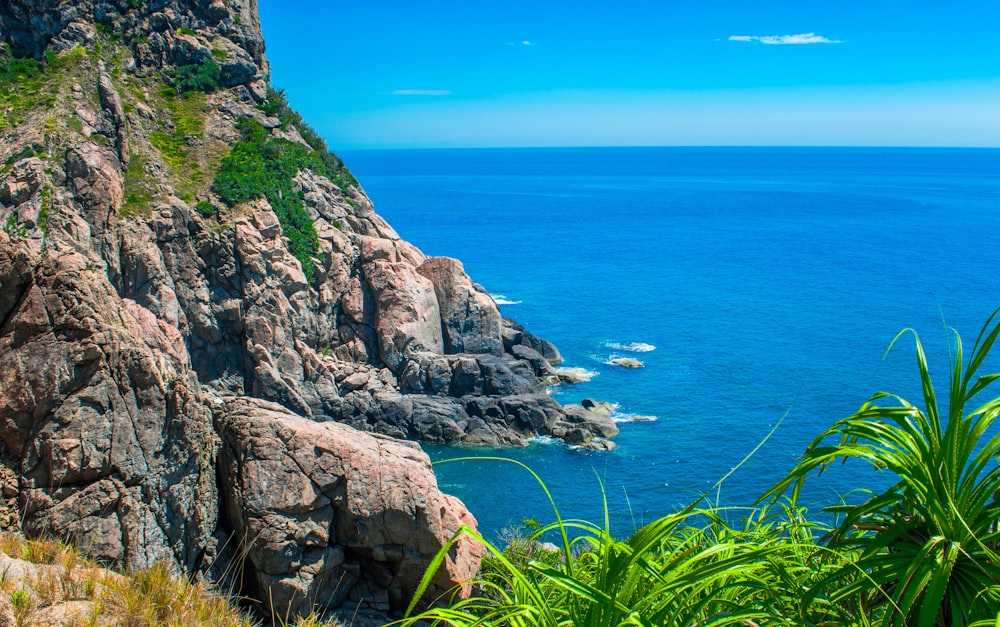 a view of the ocean from the top of a mountain