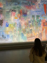 Local artists painting a vibrant mural celebrating Corning’s heritage.