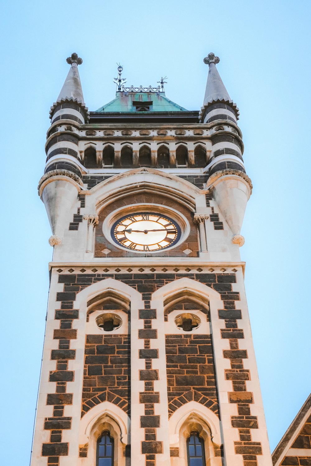 a tall clock tower with a sky background