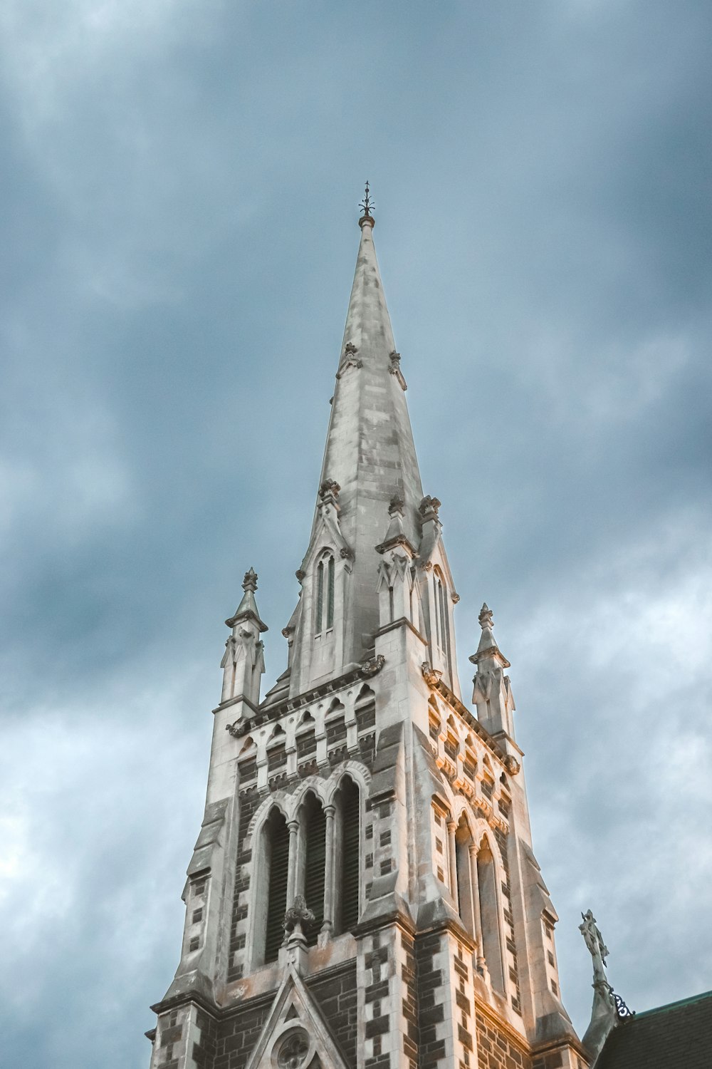 a very tall building with a clock on it's side