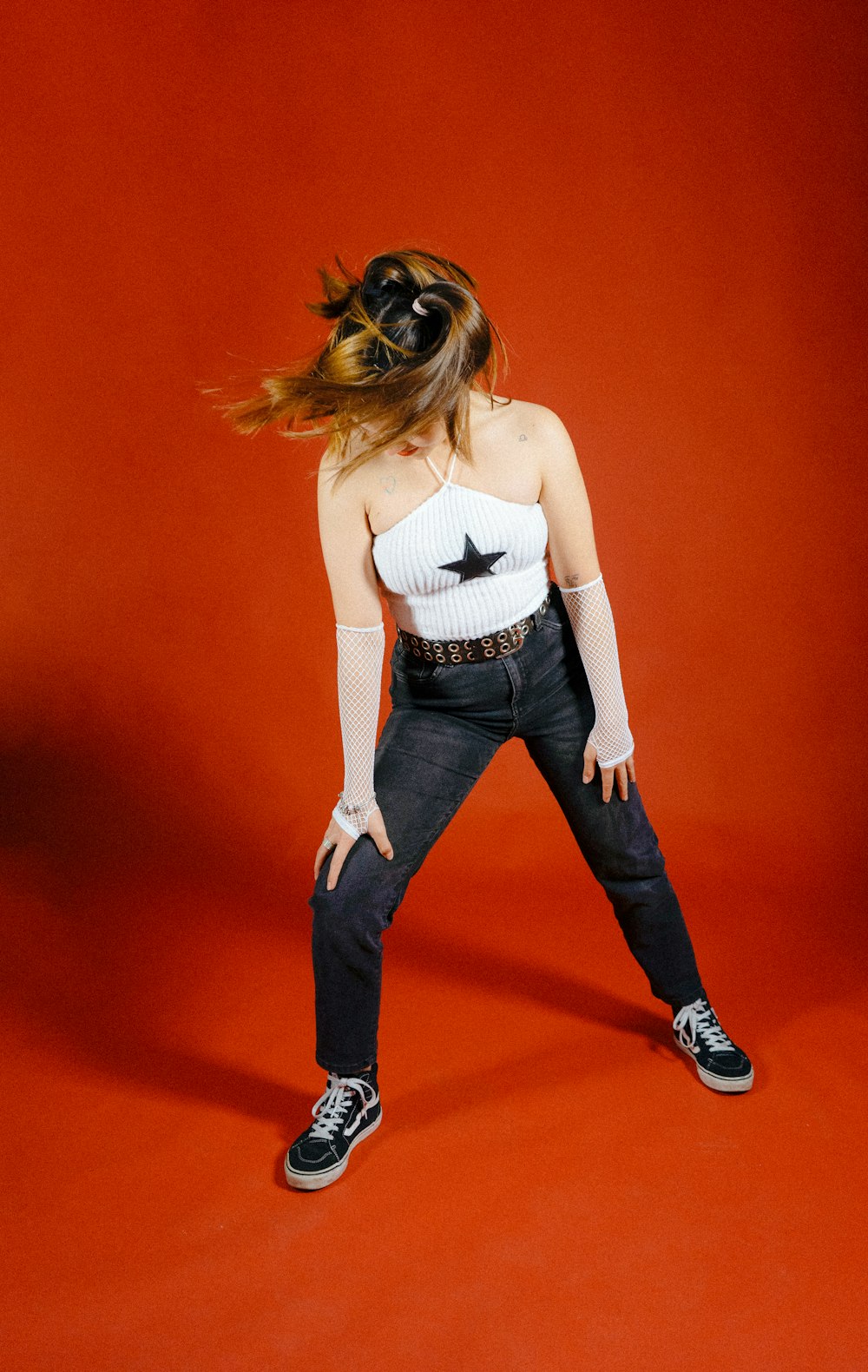 a woman with her hair blowing in the wind