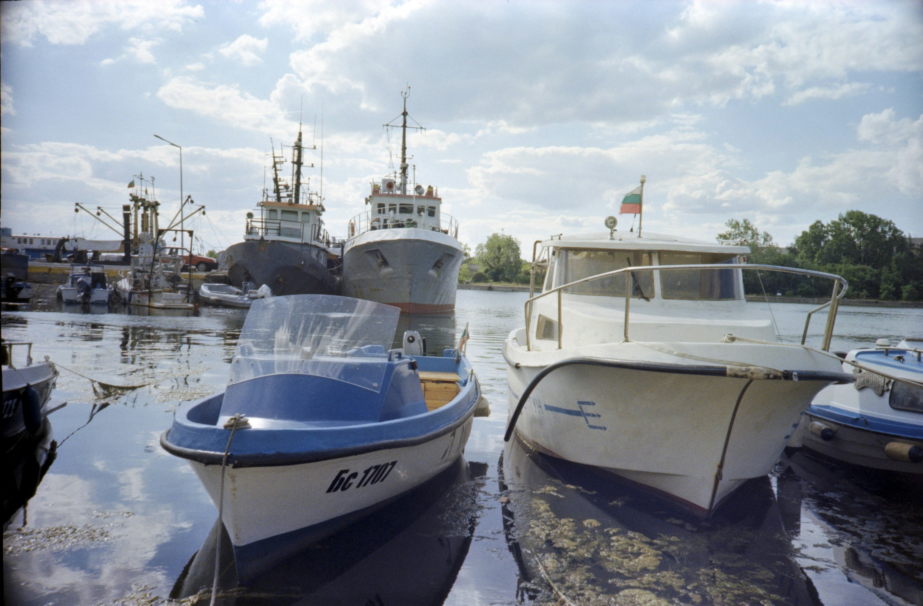 a couple of boats that are sitting in the water
