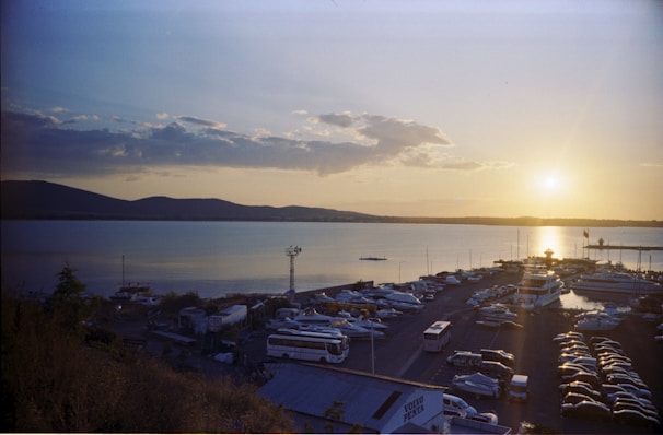 A panoramic view of Sharm El Sheikh’s marina during golden hour, boats gently bobbing.
