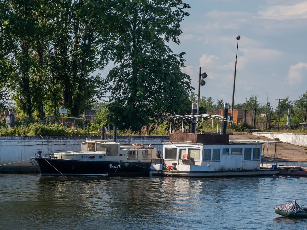 a couple of boats that are sitting in the water