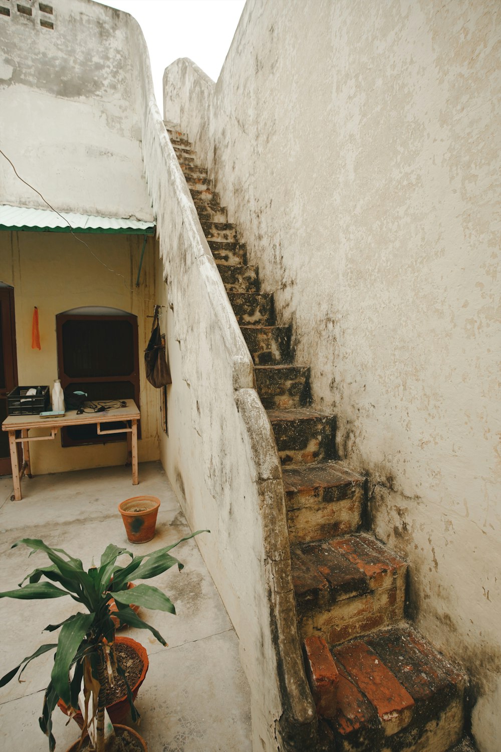 a set of stairs leading up to a tv