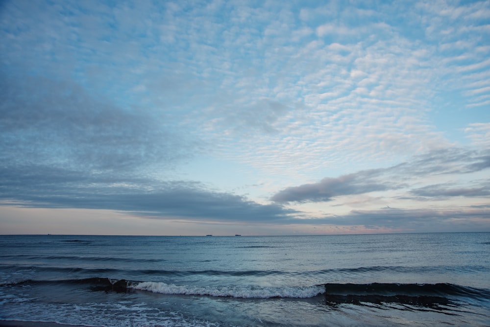 a view of the ocean from a beach