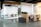 A stylish office space with contemporary decor and organized workstations.