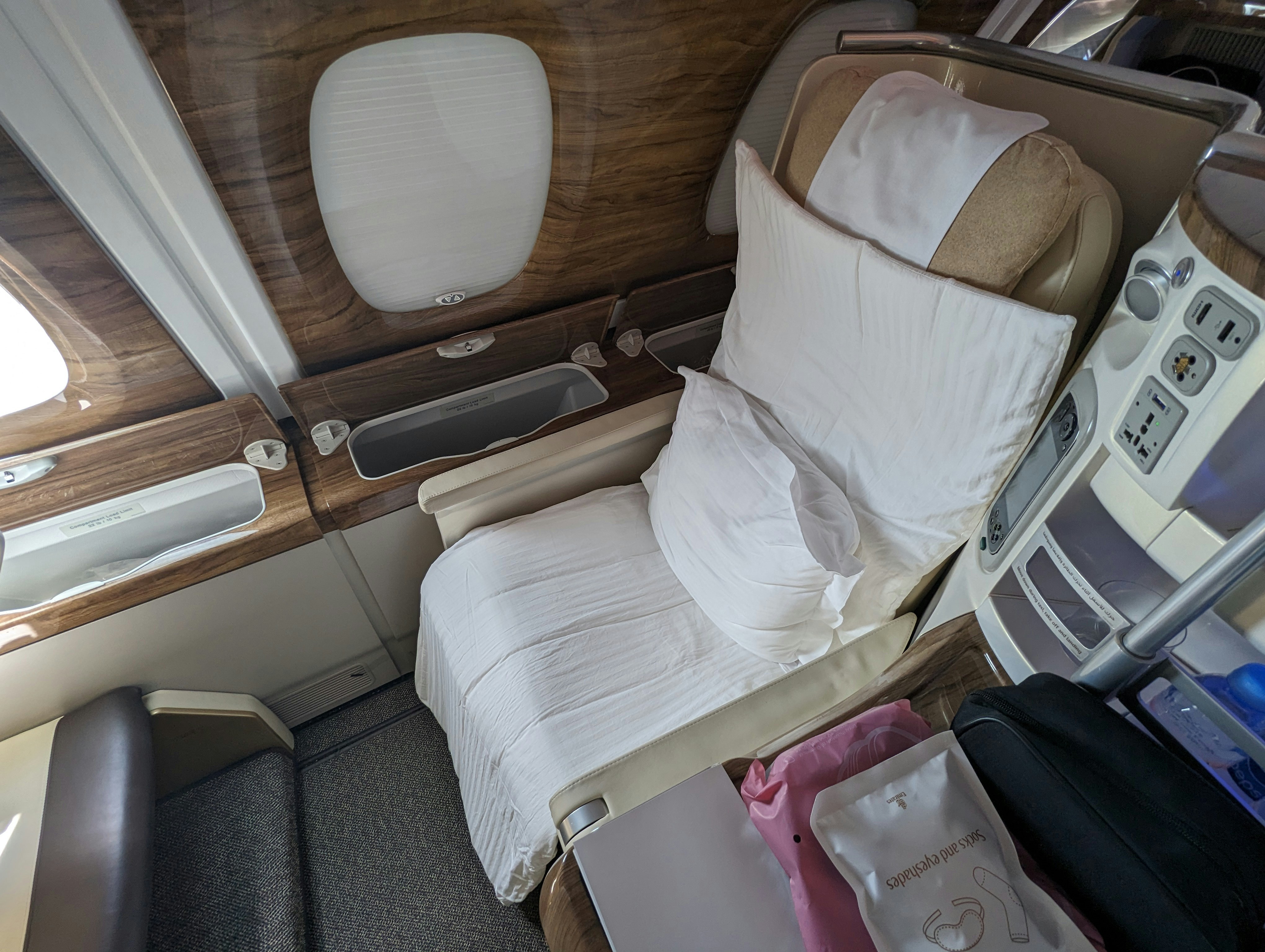 a small bed in the middle of an airplane