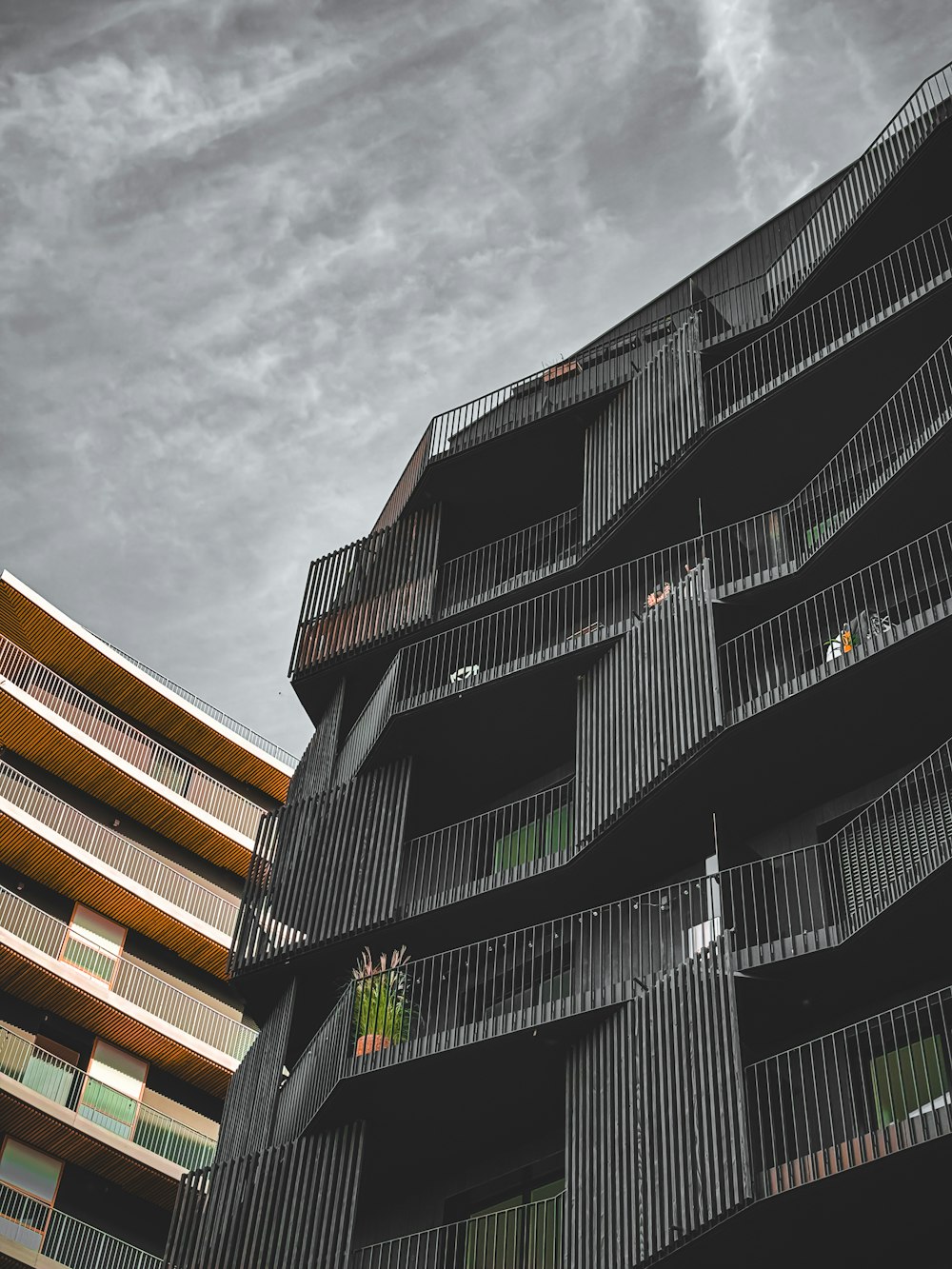 a tall building with balconies and balconies on the balconies