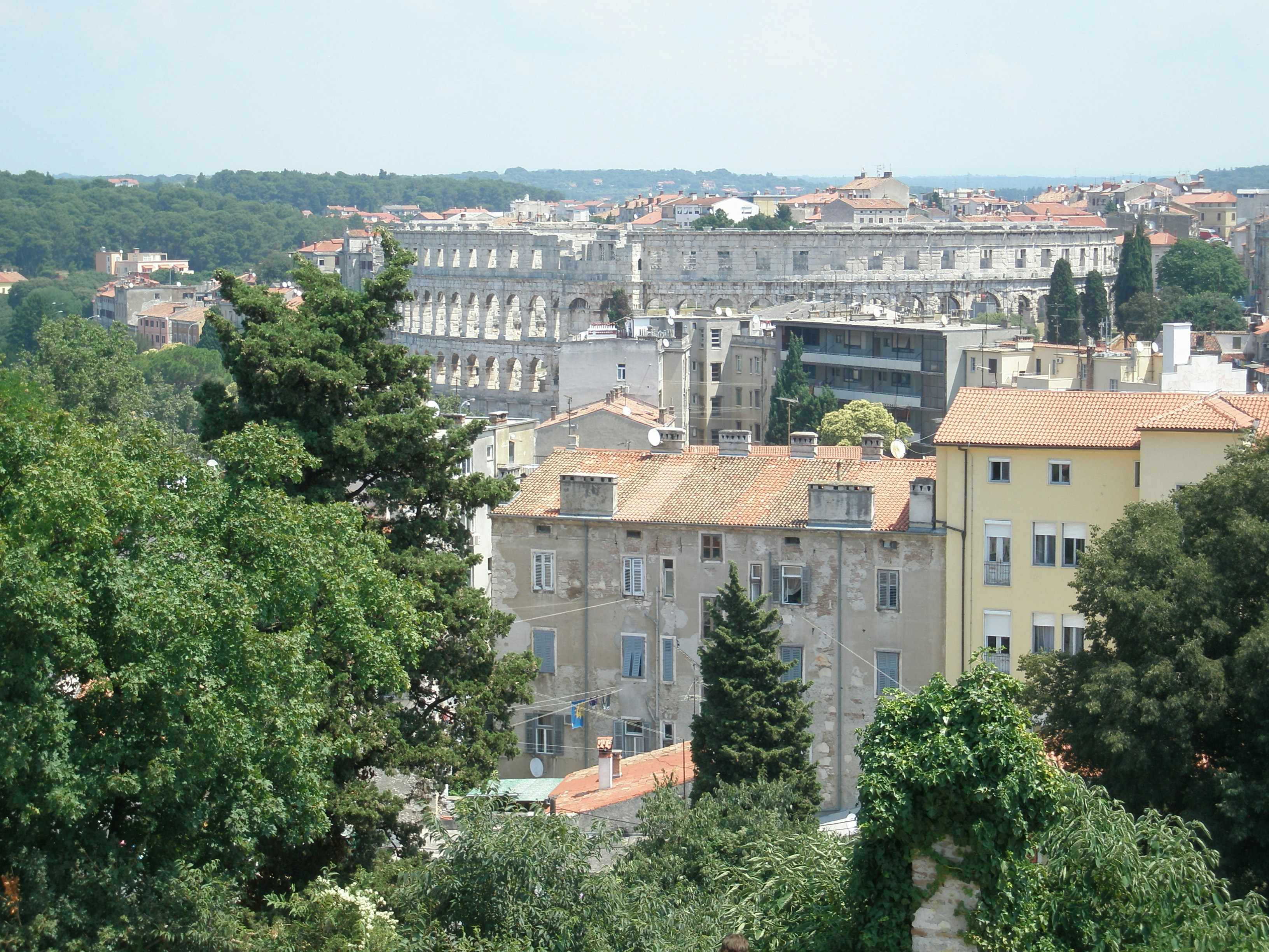 a city with lots of tall buildings and trees