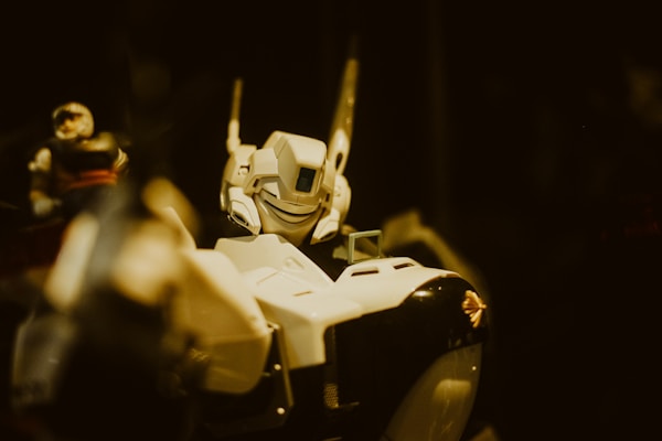 A sleek Transformers figure mid-transformation, showcasing intricate mechanical design.