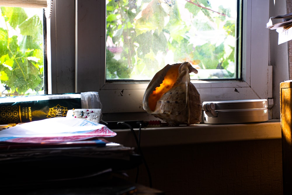 a bag sitting on top of a window sill