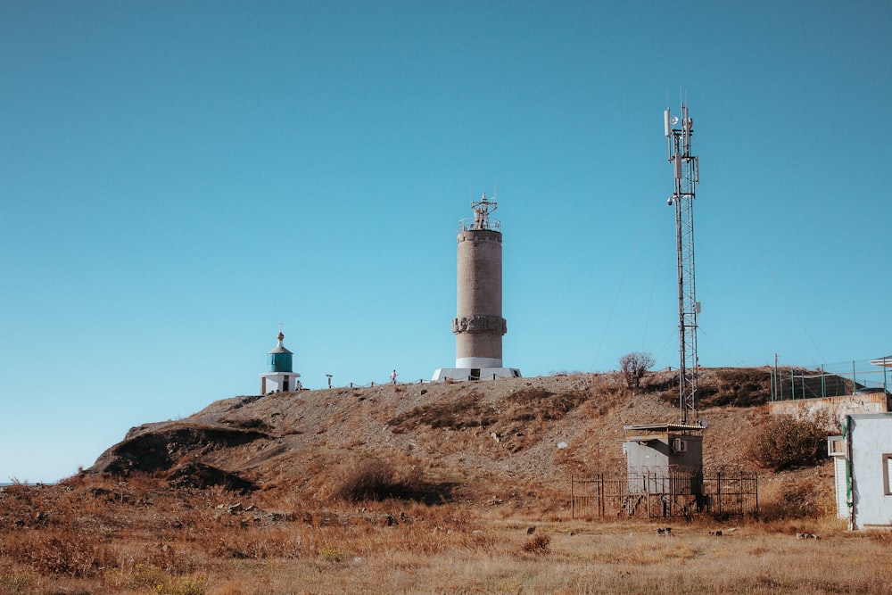 a large tower on top of a hill