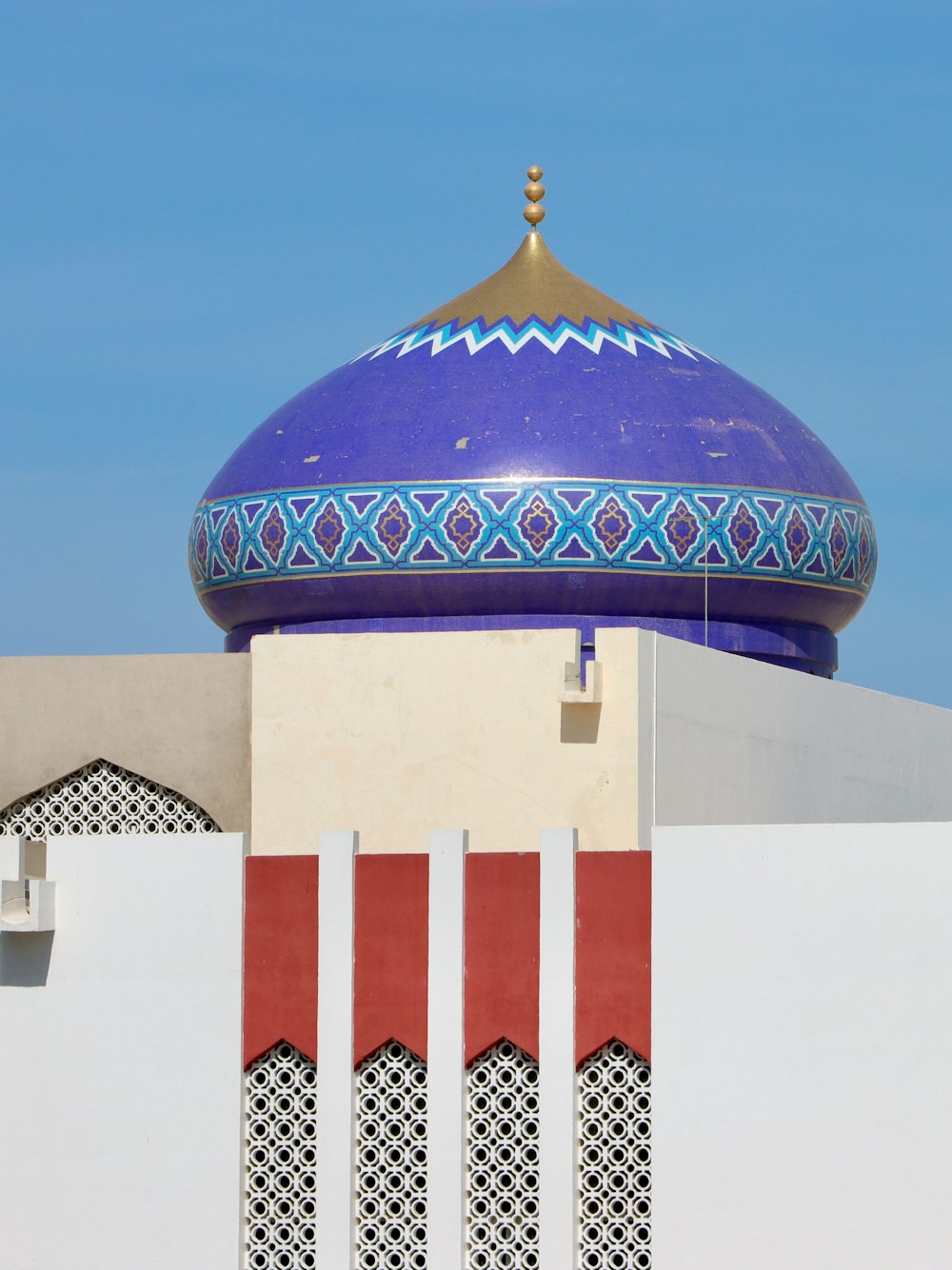 a large blue dome on top of a building