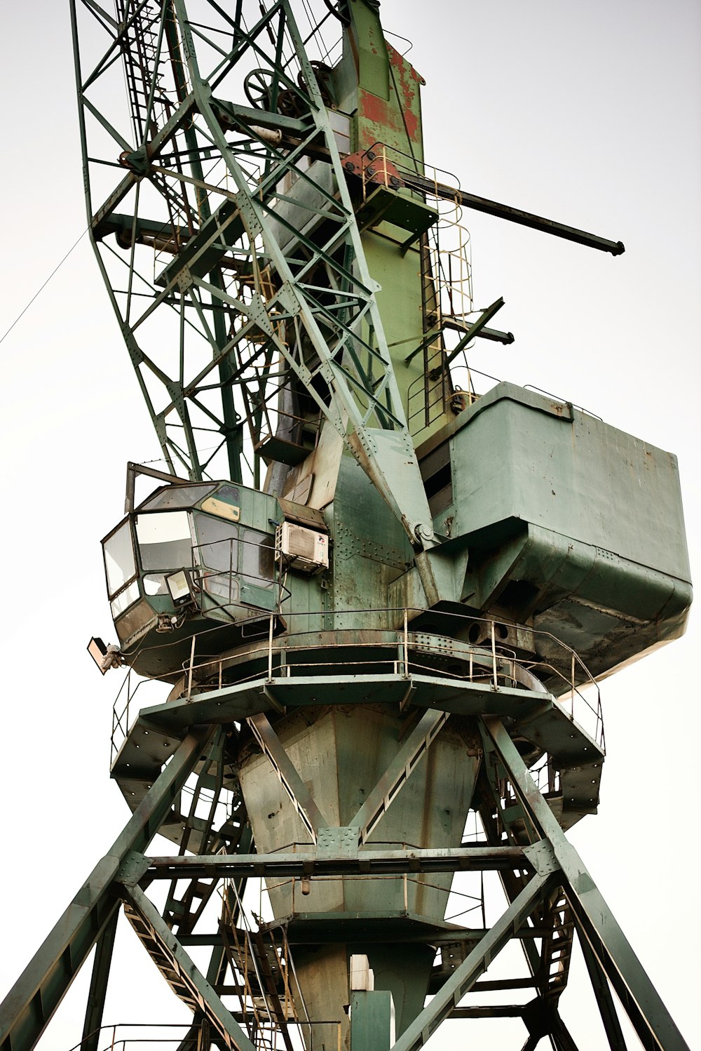 a very tall metal structure with lots of windows