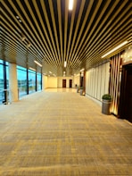 a large empty room with a lot of windows