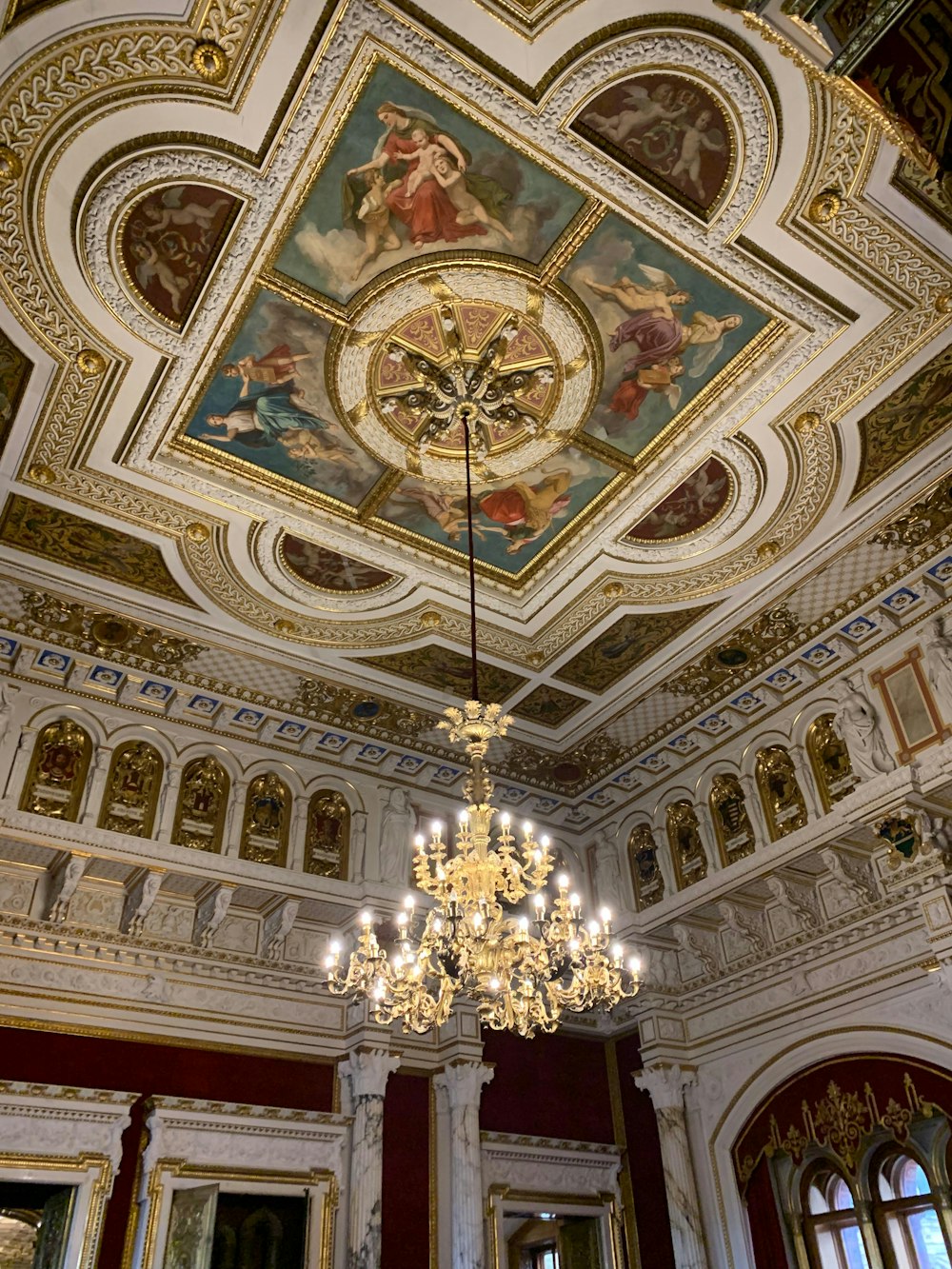 a chandelier hanging from the ceiling of a room