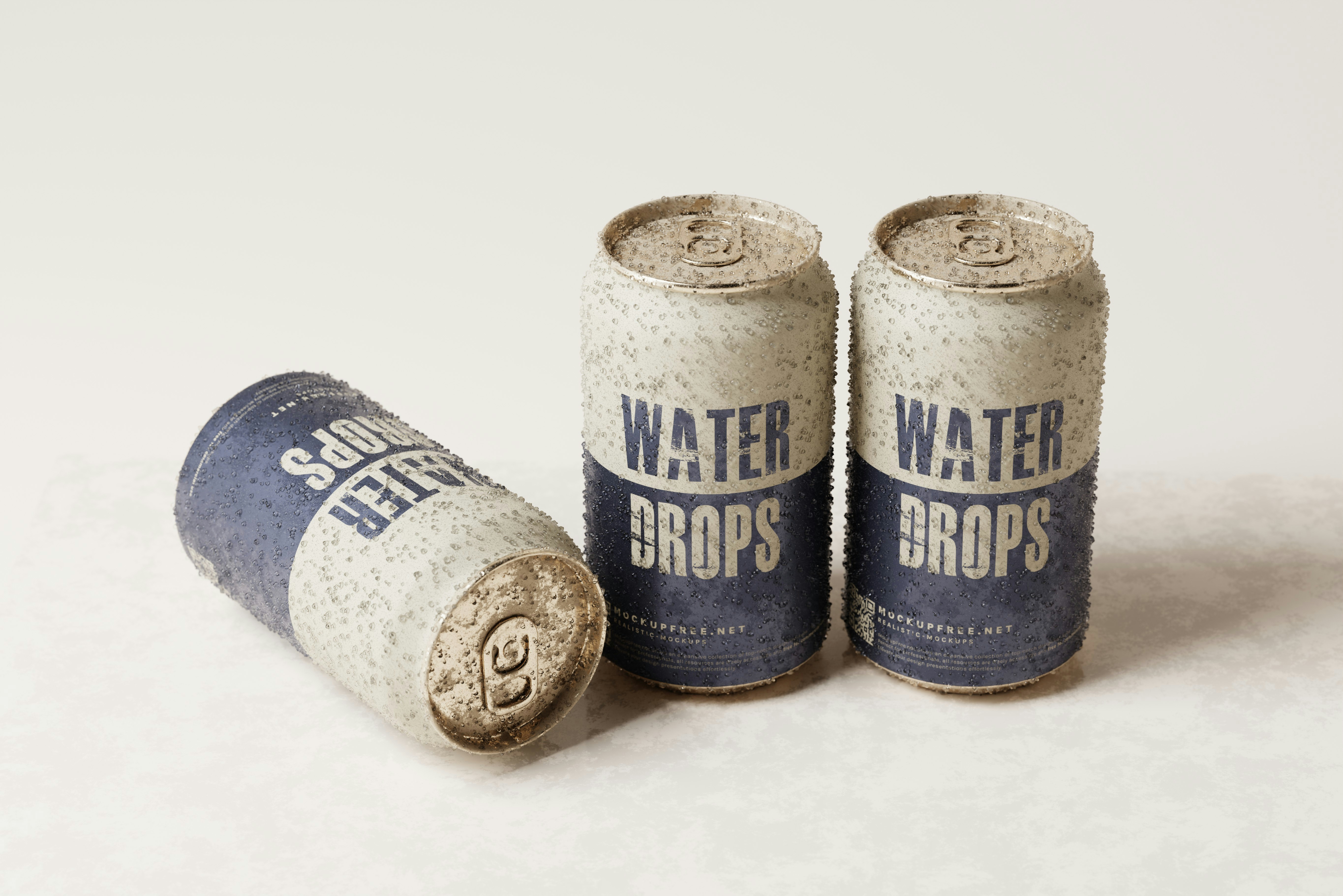 two cans of water drops on a white surface